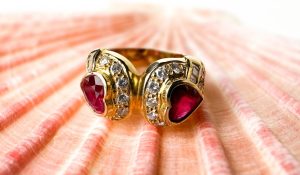 ruby ring set in 18 karat gold sold in an online auction at Hughes Auctions