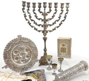Judaica Auction featuring sterling silver menorahs and kiddish cups, brass candelabras, original artwork, a large scale bronze Star of David sculpture by Marilyn Simon